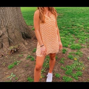 Yellow mini dress with spotted print. Purchased from Array boutique.